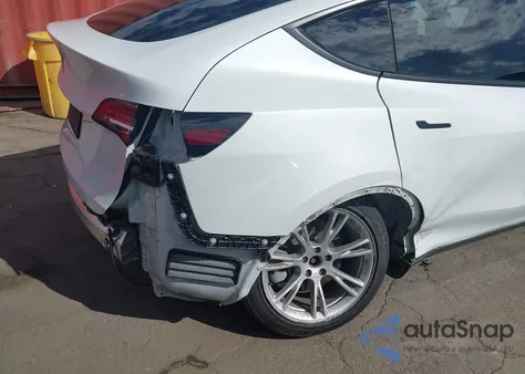 2021 Tesla Model Y Standard Range Rear-Wheel Drive from USA, damaged, VIN 5YJYGDED0MF133544